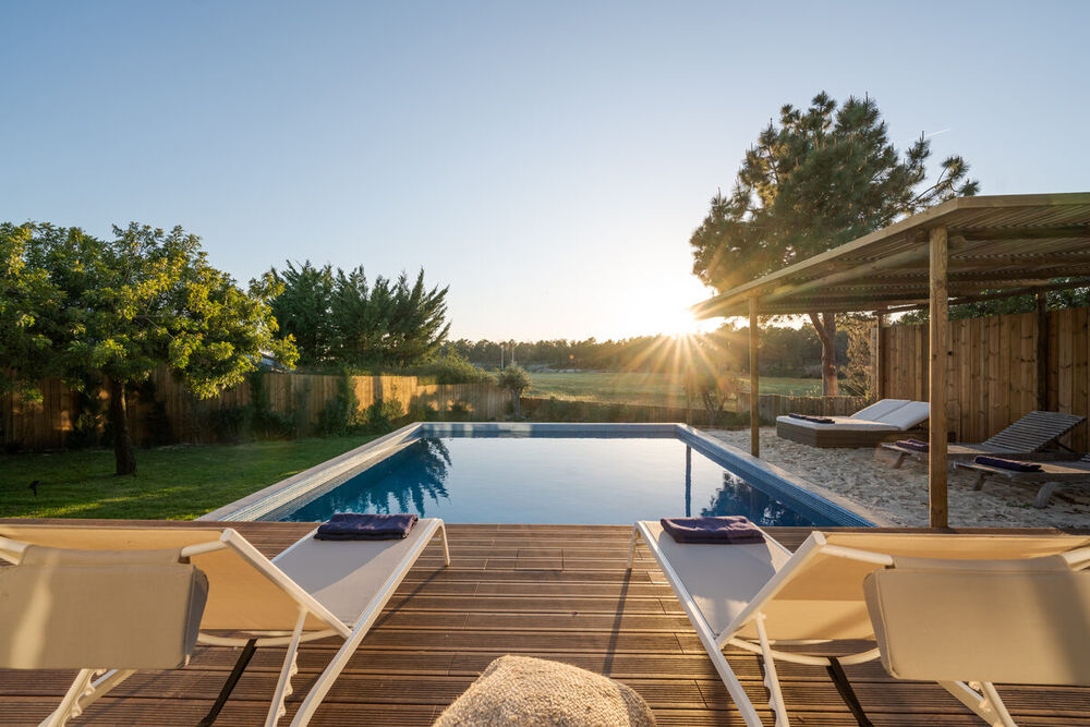Cleaned pool deck and patio at sunset