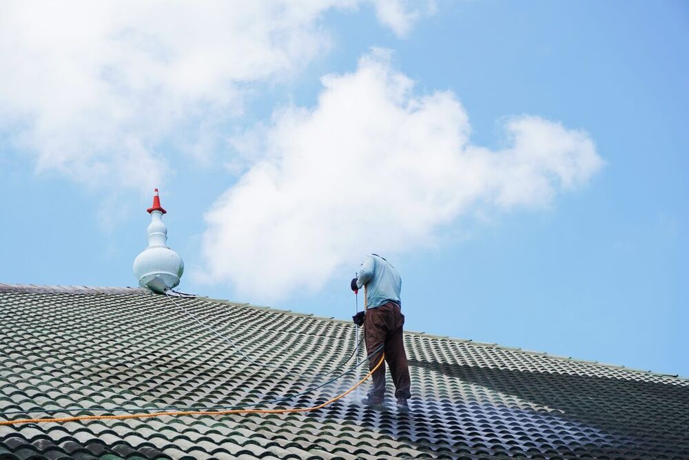 Soft washing a tile roof